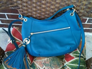 2. Who can rock this color purse?  Any guesses?