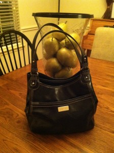 3. Who keeps their goodies in this purse?